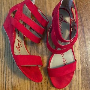 Red strappy wedge sandals